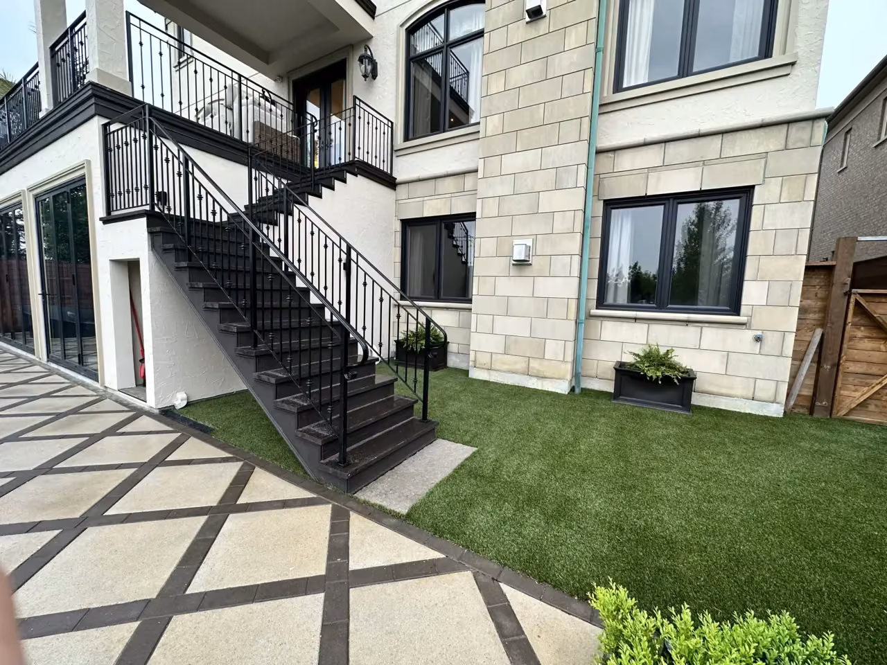 Fresh artificial grass lawn installation
